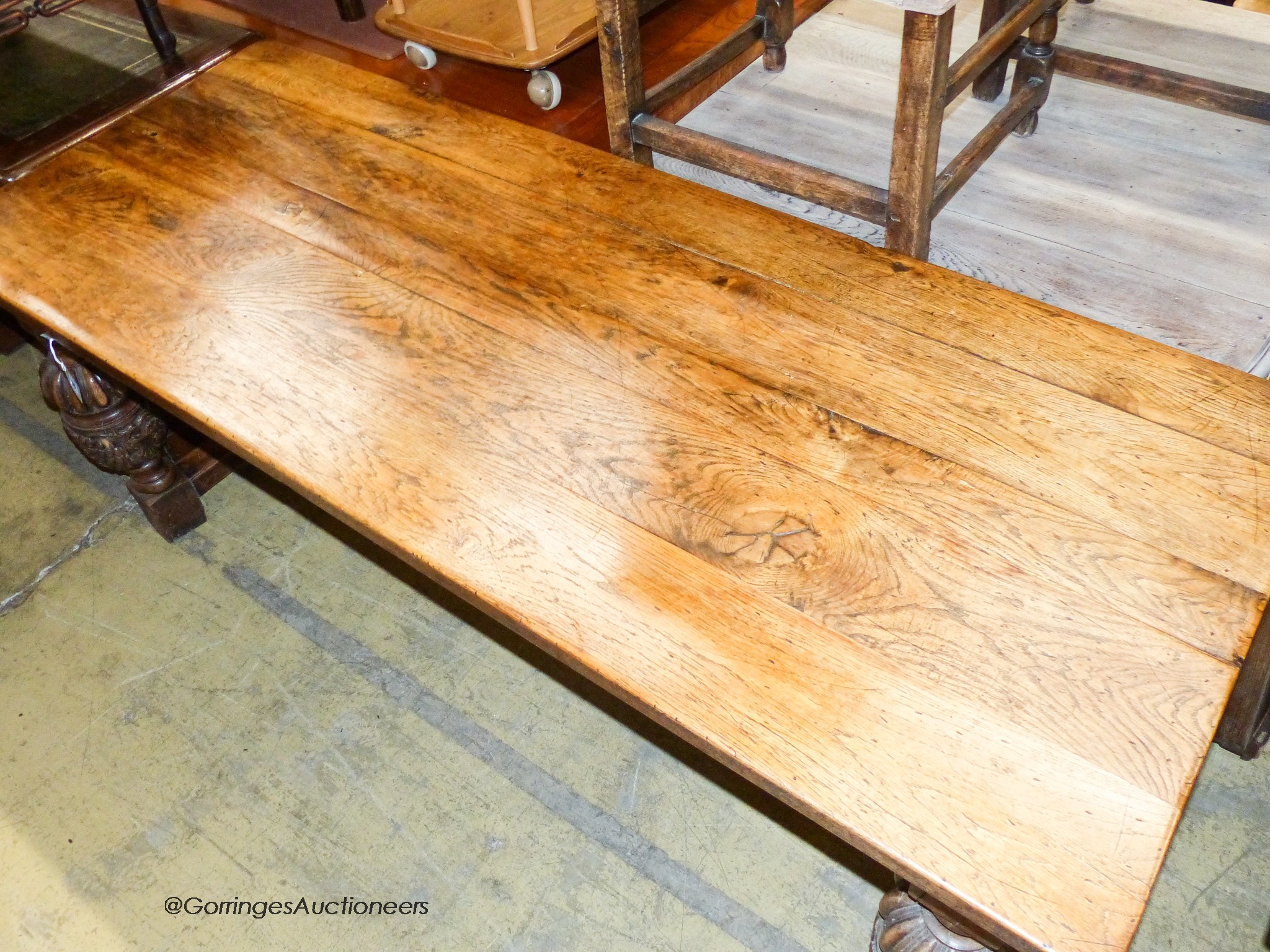 An Elizabethan style rectangular oak refectory dining table, width 198cm, depth 77cm, height 78cm
